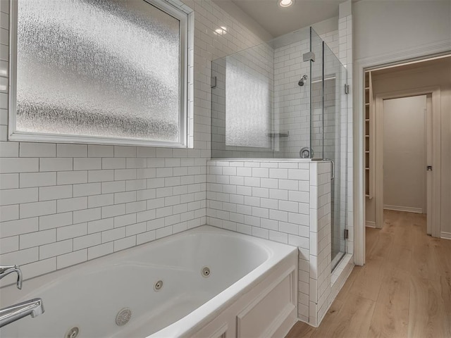 8408 NW 134th St, Oklahoma City, OK 73142 - full bath with a stall shower, wood finished floors, a whirlpool tub, and recessed lighting