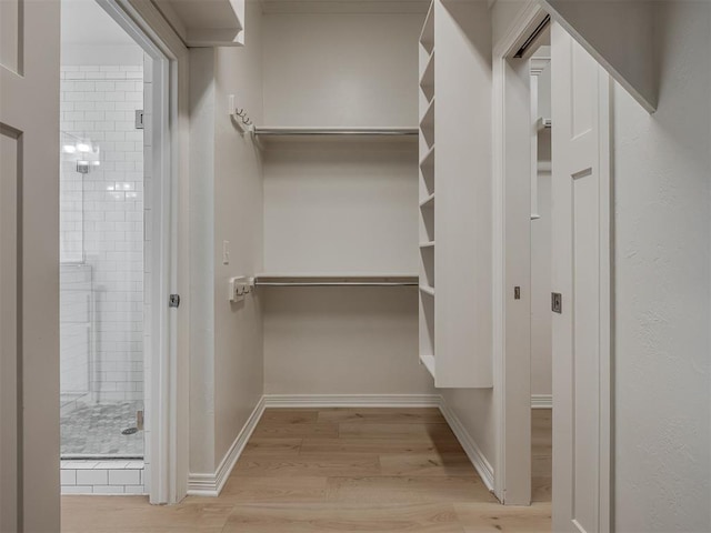 8408 NW 134th St, Oklahoma City, OK 73142 - spacious closet featuring wood finished floors