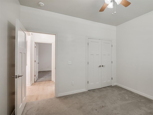 8408 NW 134th St, Oklahoma City, OK 73142 - unfurnished bedroom featuring light colored carpet, a closet, and ceiling fan