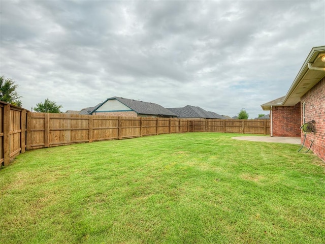8408 NW 134th St, Oklahoma City, OK 73142 - fenced backyard with a patio area