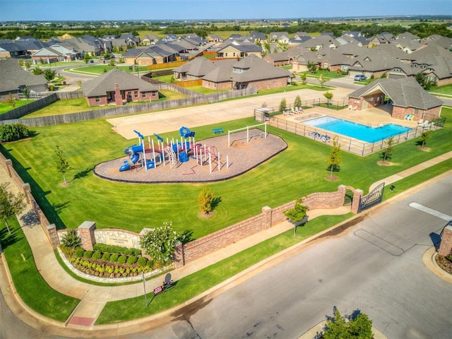 8408 NW 134th St, Oklahoma City, OK 73142 - aerial perspective of suburban area featuring a pool area and a recreational park