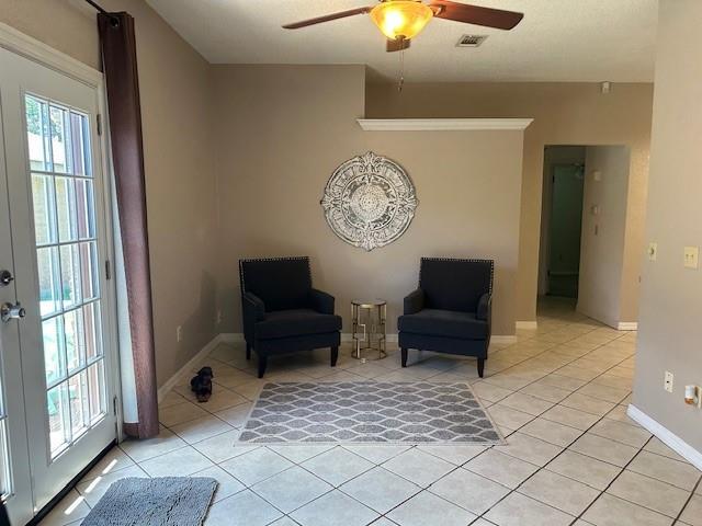 1208 SW 21st St, Oklahoma City, OK 73170 - sitting room featuring ceiling fan and light tile patterned floors