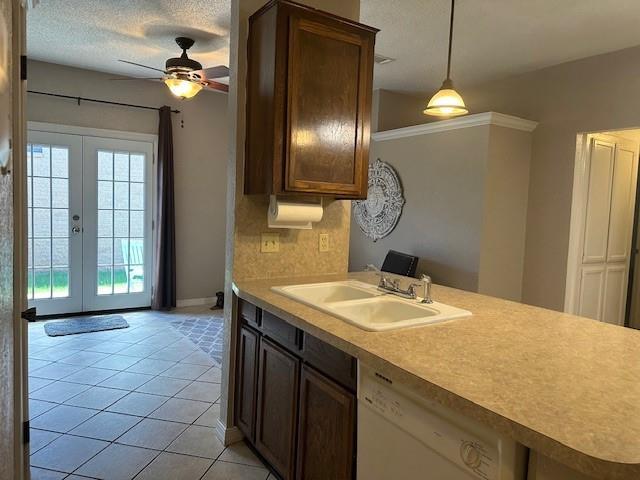 1208 SW 21st St, Oklahoma City, OK 73170 - kitchen featuring white dishwasher, light countertops, french doors, and ceiling fan