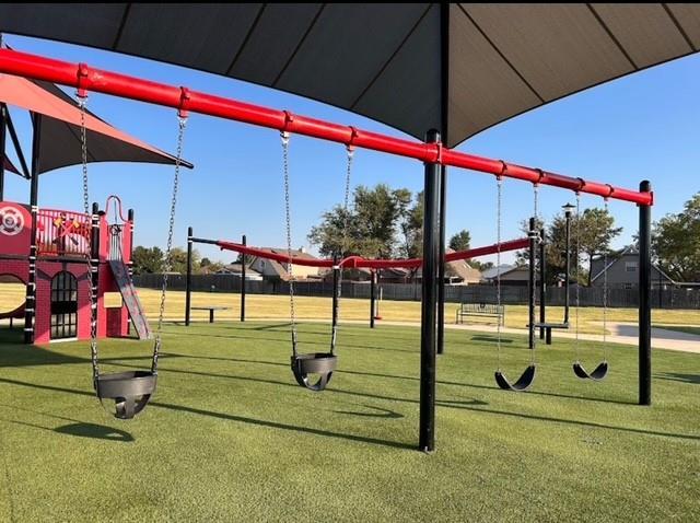 1208 SW 21st St, Oklahoma City, OK 73170 - community play area featuring a yard