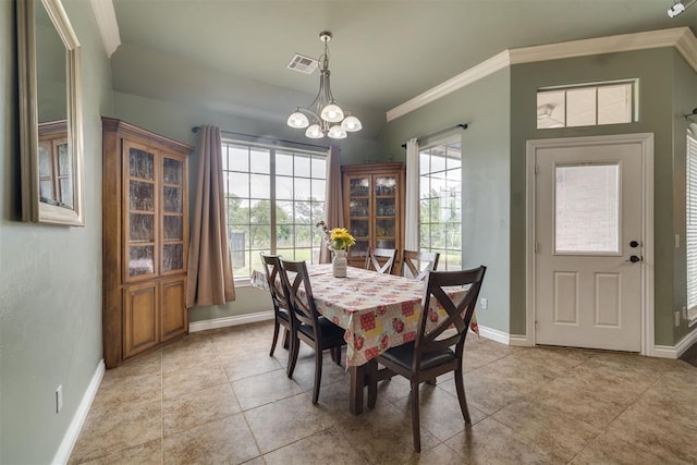 4120 S Choctaw Rd, Choctaw, OK 73020 - dining area featuring a chandelier, crown molding, and light tile patterned flooring