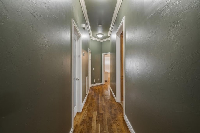 4120 S Choctaw Rd, Choctaw, OK 73020 - hall featuring wood finished floors, crown molding, and attic access