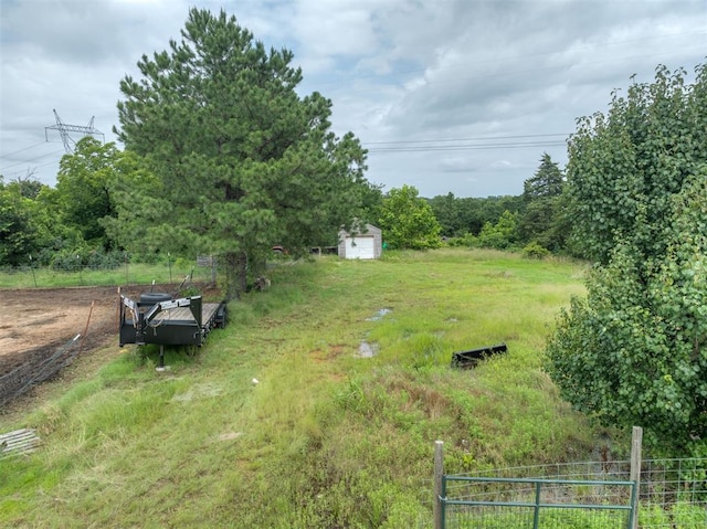 4120 S Choctaw Rd, Choctaw, OK 73020 - view of yard with a shed and a detached garage