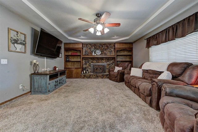 881 County St Unit 2938, Tuttle, OK 73089 - living area with carpet floors, ceiling fan, and a raised ceiling