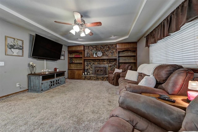 881 County St Unit 2938, Tuttle, OK 73089 - living room with a tray ceiling, carpet floors, and a ceiling fan