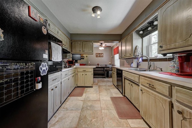 881 County St Unit 2938, Tuttle, OK 73089 - kitchen with a ceiling fan, black appliances, light countertops, a peninsula, and light tile patterned floors