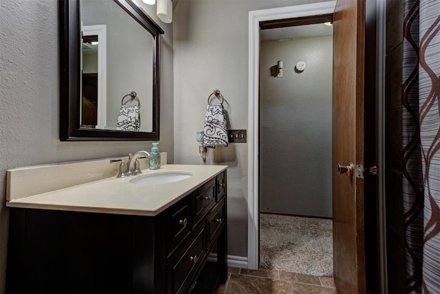 881 County St Unit 2938, Tuttle, OK 73089 - bathroom featuring vanity and a textured wall