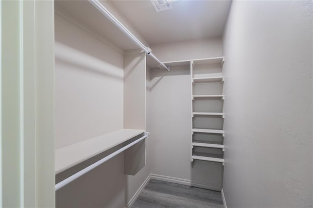 2824 SW 31st St, Oklahoma City, OK 73119 - spacious closet featuring wood finished floors