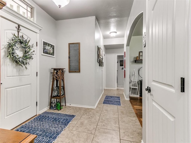 21945 N Fork Rd, Luther, OK 73054 - entrance foyer with light tile patterned floors and arched walkways