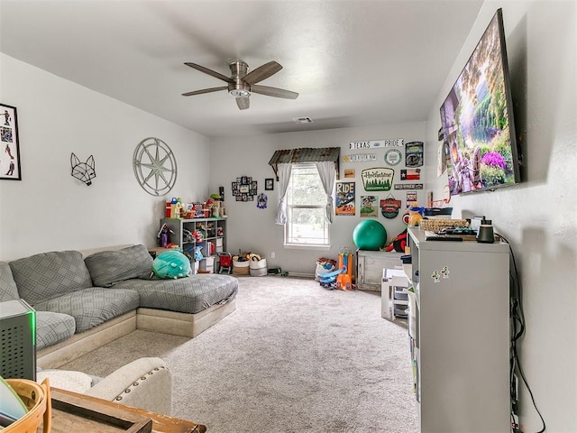 21945 N Fork Rd, Luther, OK 73054 - carpeted living area with a ceiling fan