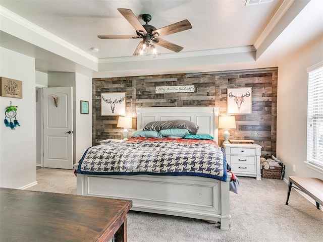 21945 N Fork Rd, Luther, OK 73054 - bedroom featuring crown molding, multiple windows, an accent wall, light carpet, and wooden walls