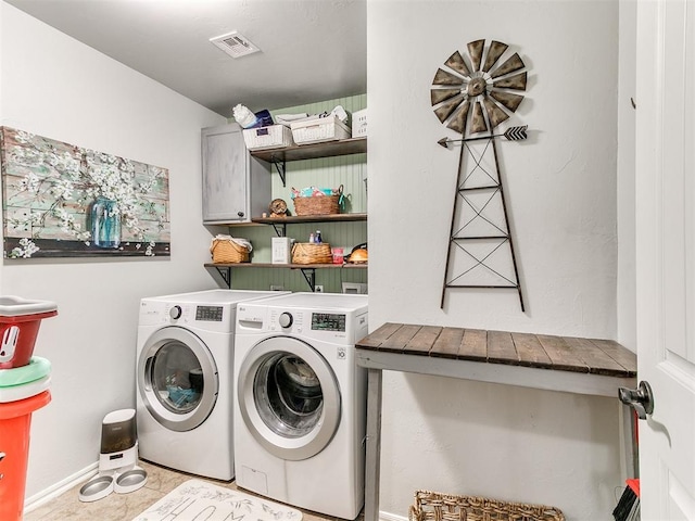 21945 N Fork Rd, Luther, OK 73054 - laundry room with washing machine and dryer, cabinet space, and tile patterned floors