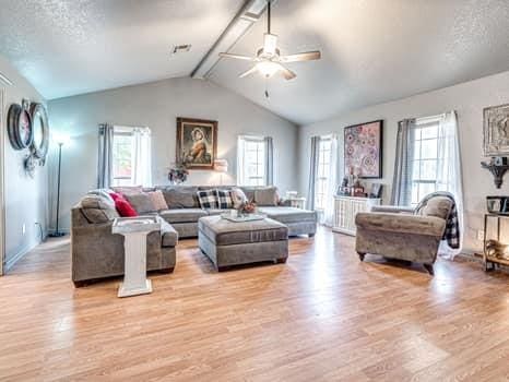 23 Lake Ln, Shawnee, OK 74804 - living room featuring ceiling fan, light wood-style flooring, and plenty of natural light