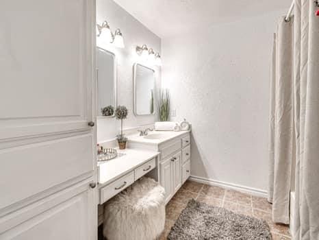 23 Lake Ln, Shawnee, OK 74804 - bathroom with vanity and a shower with shower curtain
