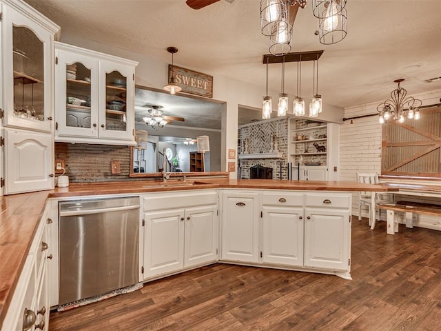 434 N Oak Ave, Hennessey, OK 73742 - kitchen featuring stainless steel dishwasher, a ceiling fan, butcher block counters, and a textured ceiling