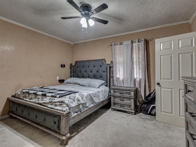434 N Oak Ave, Hennessey, OK 73742 - bedroom with light carpet, a textured ceiling, ornamental molding, and a ceiling fan