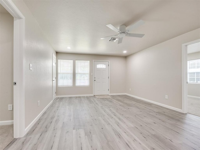 3609 S Quapah Ave, Oklahoma City, OK 73119 - unfurnished living room featuring ceiling fan, light wood finished floors, and recessed lighting