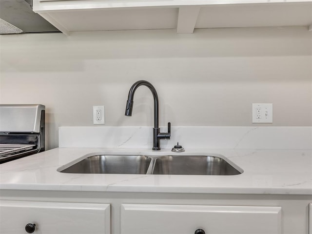 3609 S Quapah Ave, Oklahoma City, OK 73119 - kitchen view of white cabinetry and light stone countertops