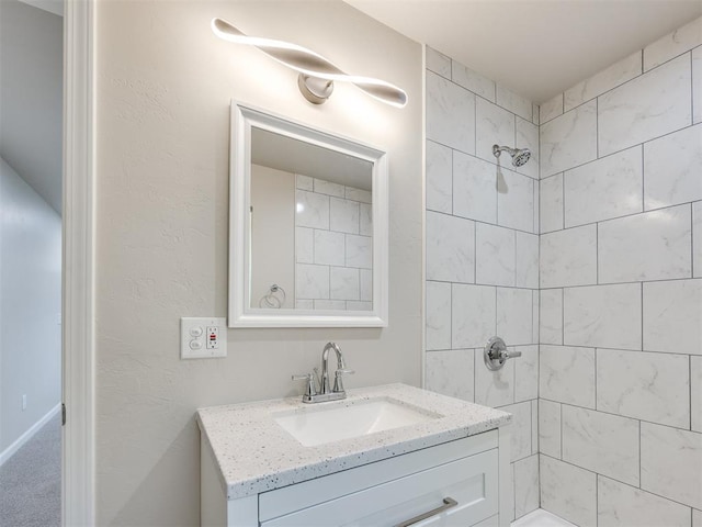 3609 S Quapah Ave, Oklahoma City, OK 73119 - bathroom featuring tiled shower and vanity
