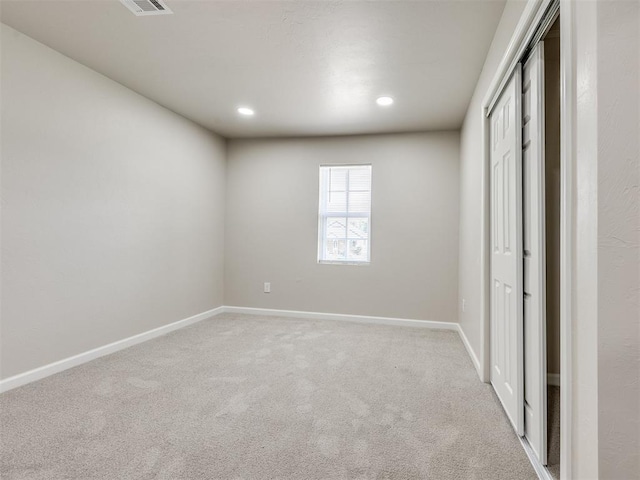3609 S Quapah Ave, Oklahoma City, OK 73119 - unfurnished bedroom with carpet flooring, a closet, and recessed lighting