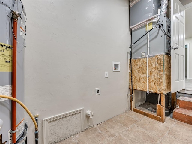 3609 S Quapah Ave, Oklahoma City, OK 73119 - laundry room with washer hookup, water heater, and hookup for an electric dryer