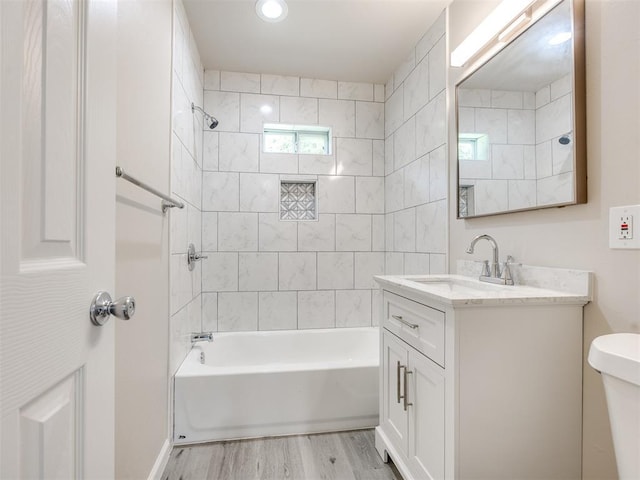 3609 S Quapah Ave, Oklahoma City, OK 73119 - bathroom featuring vanity, wood finished floors, bathtub / shower combination, and recessed lighting