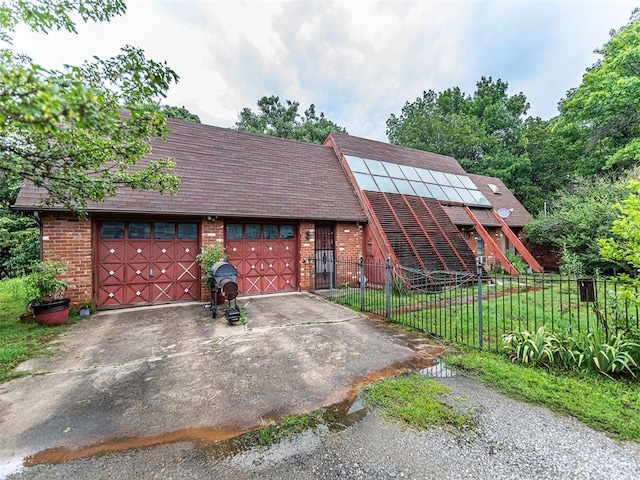 14345 N Harrah Rd, Luther, OK 73054 - view of front facade with asphalt driveway and brick siding