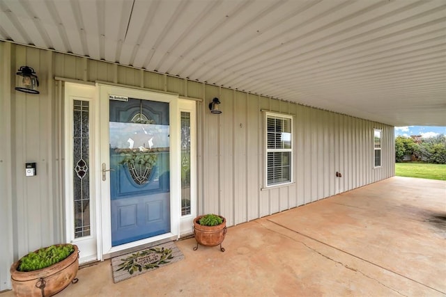 22071 E 1250th Rd, Rocky, OK 73661 - doorway to property with board and batten siding