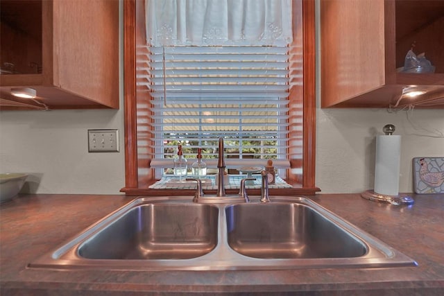 22071 E 1250th Rd, Rocky, OK 73661 - kitchen view of a sink and dark countertops