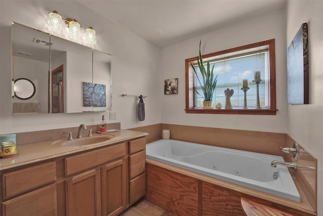 22071 E 1250th Rd, Rocky, OK 73661 - full bathroom with vanity and a whirlpool tub