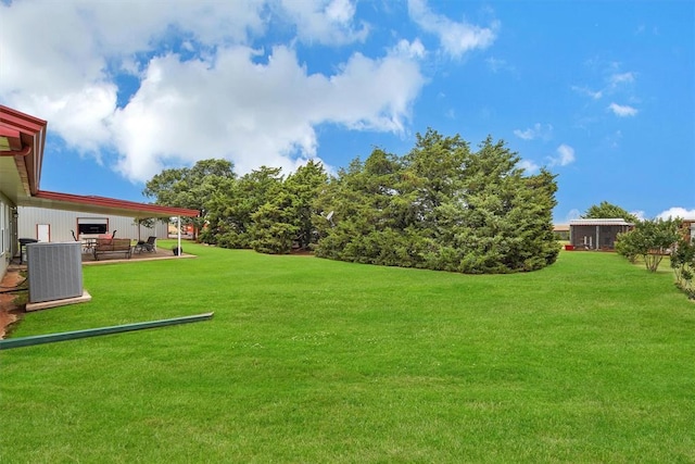 22071 E 1250th Rd, Rocky, OK 73661 - view of grassy yard featuring a patio area