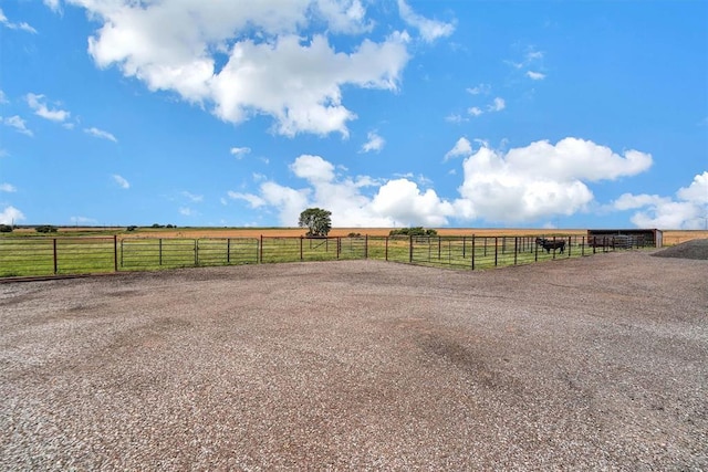 22071 E 1250th Rd, Rocky, OK 73661 - view of yard with an outdoor riding arena and a rural view