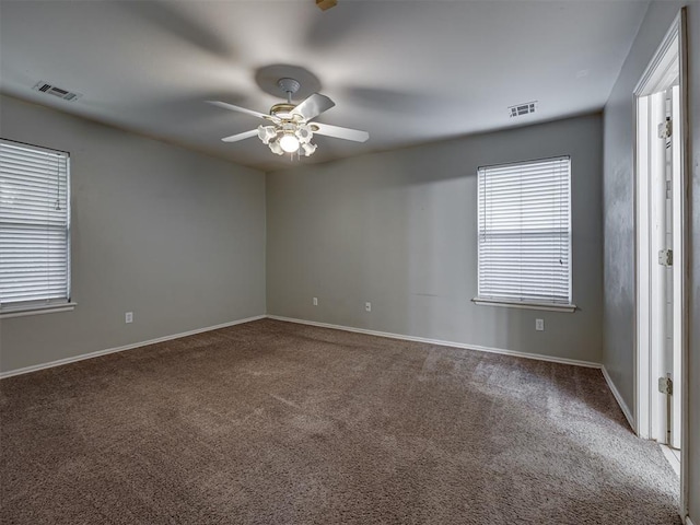 12300 NW 4th St, Yukon, OK 73099 - carpeted empty room featuring ceiling fan and baseboards