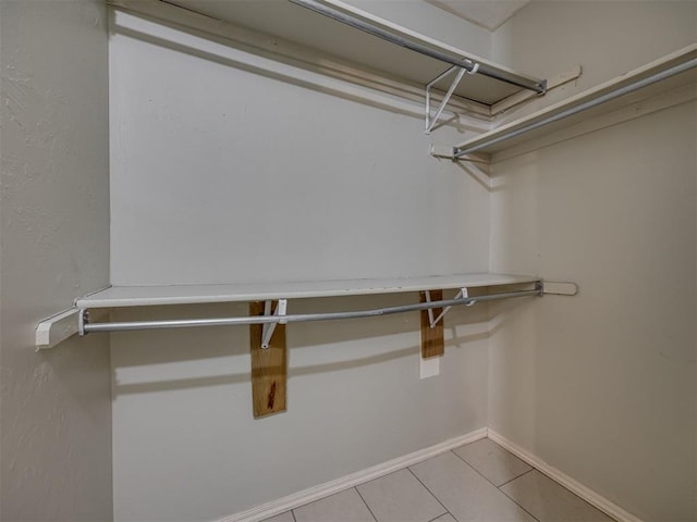 12300 NW 4th St, Yukon, OK 73099 - walk in closet with tile patterned flooring