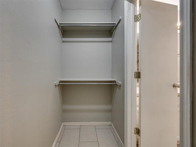 12300 NW 4th St, Yukon, OK 73099 - walk in closet with tile patterned flooring