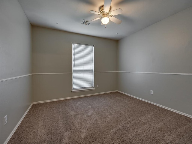 12300 NW 4th St, Yukon, OK 73099 - unfurnished room with ceiling fan and carpet floors
