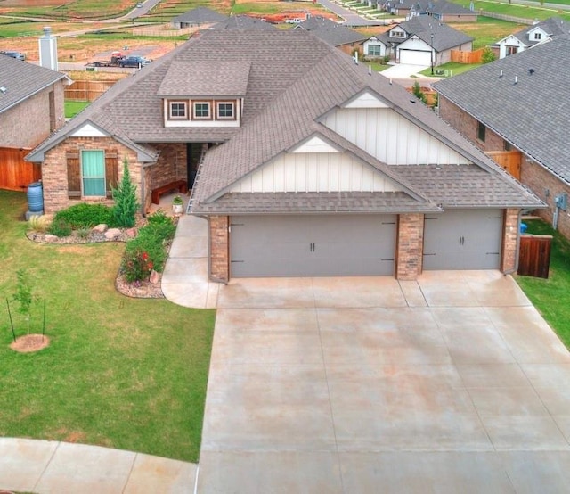 8401 Poplar Dr, Edmond, OK 73034 - view of front of property featuring roof with shingles, a garage, concrete driveway, brick siding, and board and batten siding