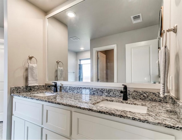 8401 Poplar Dr, Edmond, OK 73034 - full bath featuring double vanity and recessed lighting