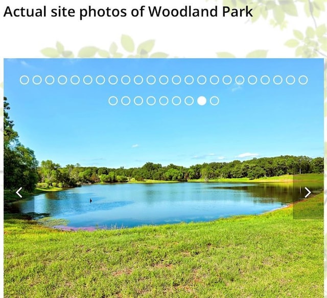 8401 Poplar Dr, Edmond, OK 73034 - water view featuring a heavily wooded area