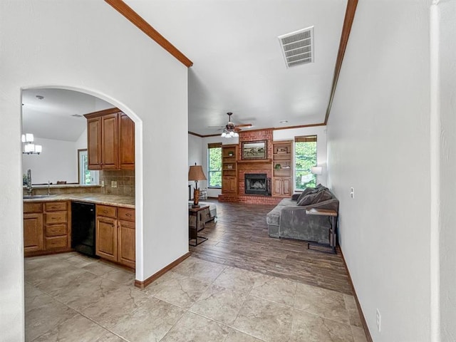 12200 Whispering Pnes, Guthrie, OK 73044 - corridor featuring ornamental molding and arched walkways