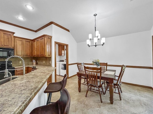12200 Whispering Pnes, Guthrie, OK 73044 - dining space featuring separate washer and dryer, a chandelier, crown molding, recessed lighting, and lofted ceiling