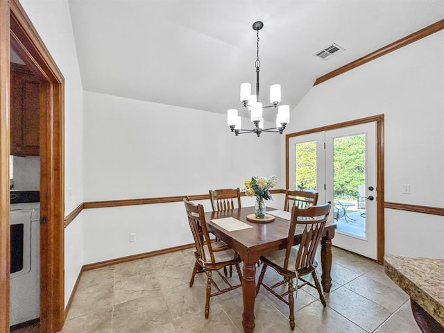 12200 Whispering Pnes, Guthrie, OK 73044 - dining room featuring lofted ceiling, washer / clothes dryer, and a chandelier