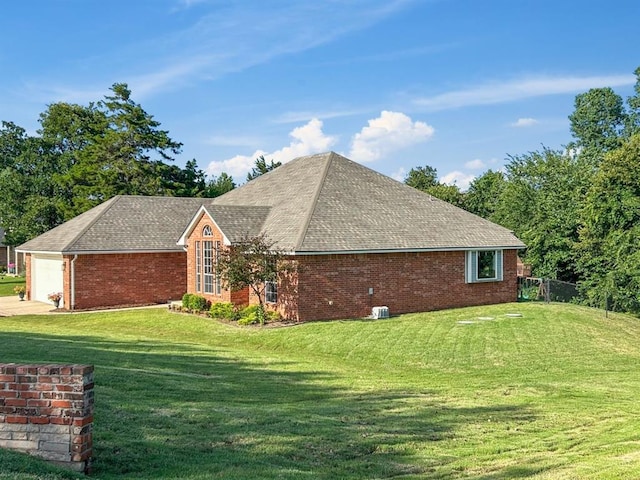 12200 Whispering Pnes, Guthrie, OK 73044 - view of side of home featuring brick siding, a shingled roof, and a garage