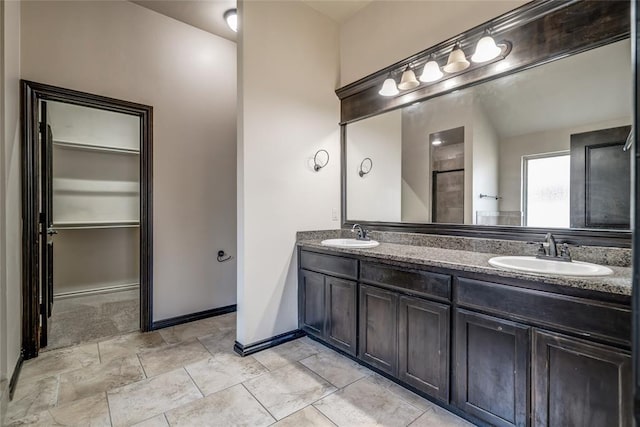 3904 Normandy Rd, Edmond, OK 73013 - full bath featuring double vanity and a spacious closet