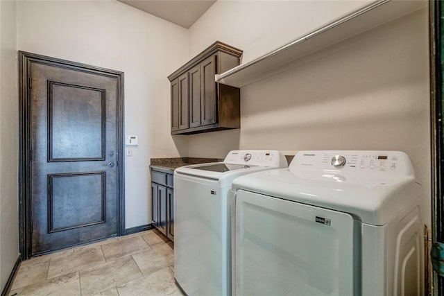3904 Normandy Rd, Edmond, OK 73013 - laundry area with cabinet space and washer and dryer