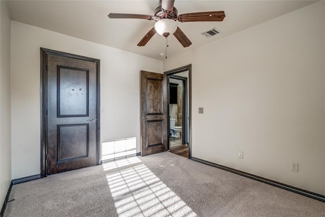 3904 Normandy Rd, Edmond, OK 73013 - unfurnished bedroom featuring carpet floors and a ceiling fan